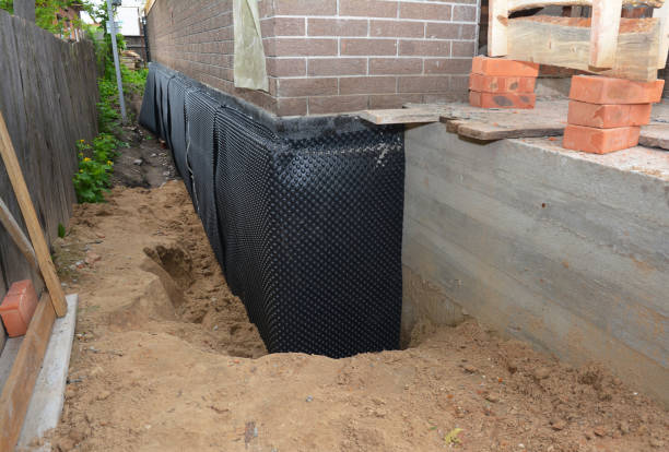 Happy homeowners after waterproofing job in Duncanville